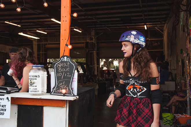 Alivia Lynch—aka "Plum Crazy"—of Sunshine City Roller Derby, pictured during an October 8, 2019 concert and derby at the Slayground in St. Petersburg, Florida. - Adam Cole Boehm