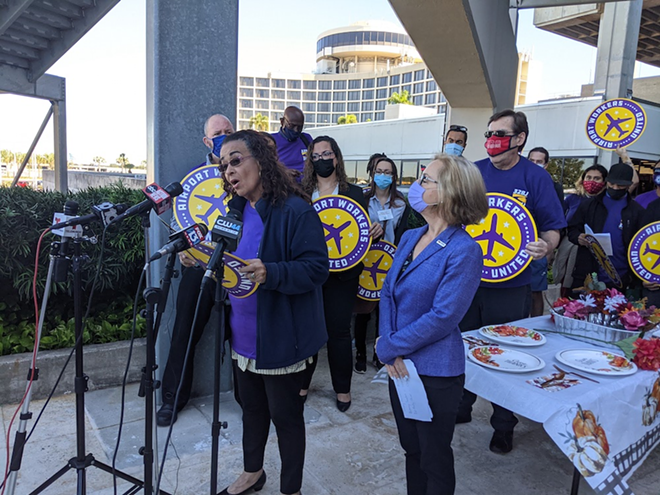 Gladys Perez speaks about her working conditions at Tampa International Airport. - Justin Garcia