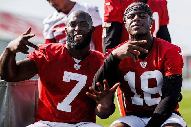 Leonard Fournette (L) and Tyler Johnson during practice at One Buc Place in Tampa, Florida on Dec. 9, 2021. - TORI RICHMAN/TAMPA BAY BUCCANEERS