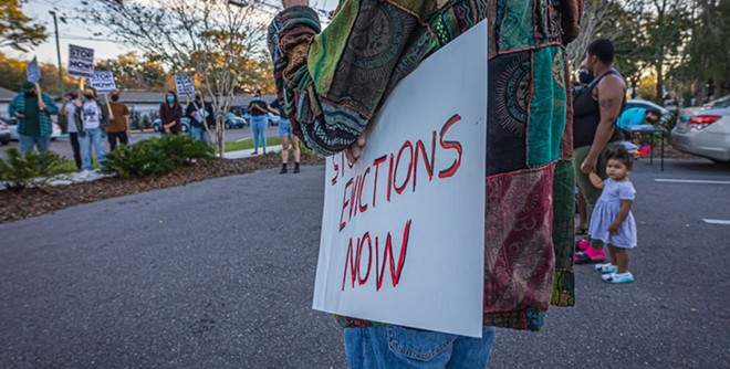 Tampa residents protest a mass eviction. - Dave Decker