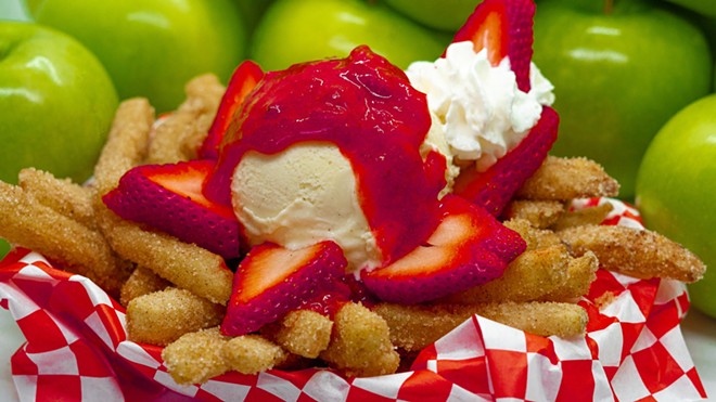 Apple fry sundae with strawberry compote, vanilla ice cream, fresh strawberries and whipped cream over crispy apple fries . - Florida Strawberry Festival / Facebook