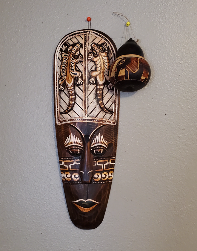 An African mask owned by Tampa poet Negasi. - C/O NEGASI