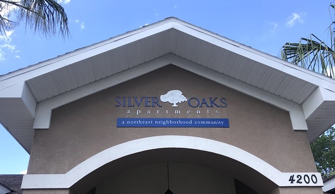 The sign above the leasing office at Silver Oaks Apartments in East Tampa. - Justin Garcia