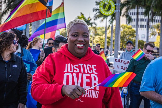 Michelle Rayner marches in St. Petersburg, Florida on March 12, 2022. - Photo by Dave Decker