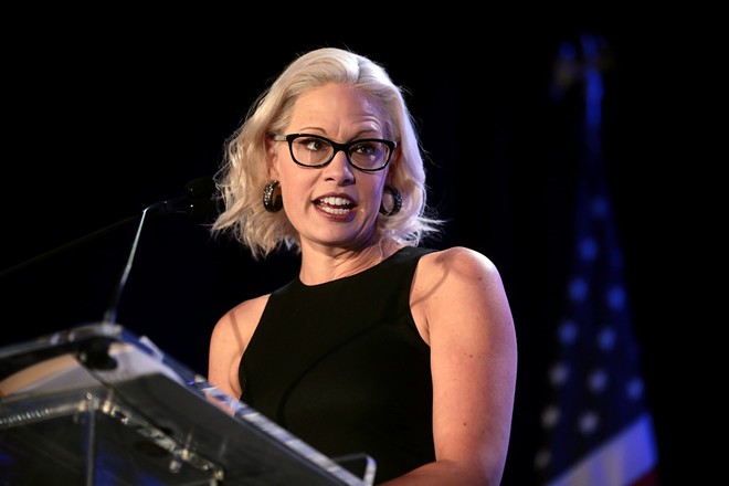 U.S. Senator Kyrsten Sinema speaking with attendees at the 2019 Legislative Forecast Luncheon hosted by the Arizona Chamber of Commerce & Industry at the Arizona Biltmore in Phoenix, Arizona. - Gage Skidmore from Peoria, AZ, United States of America / CC BY-SA (https://creativecommons.org/licenses/by-sa/2.0)