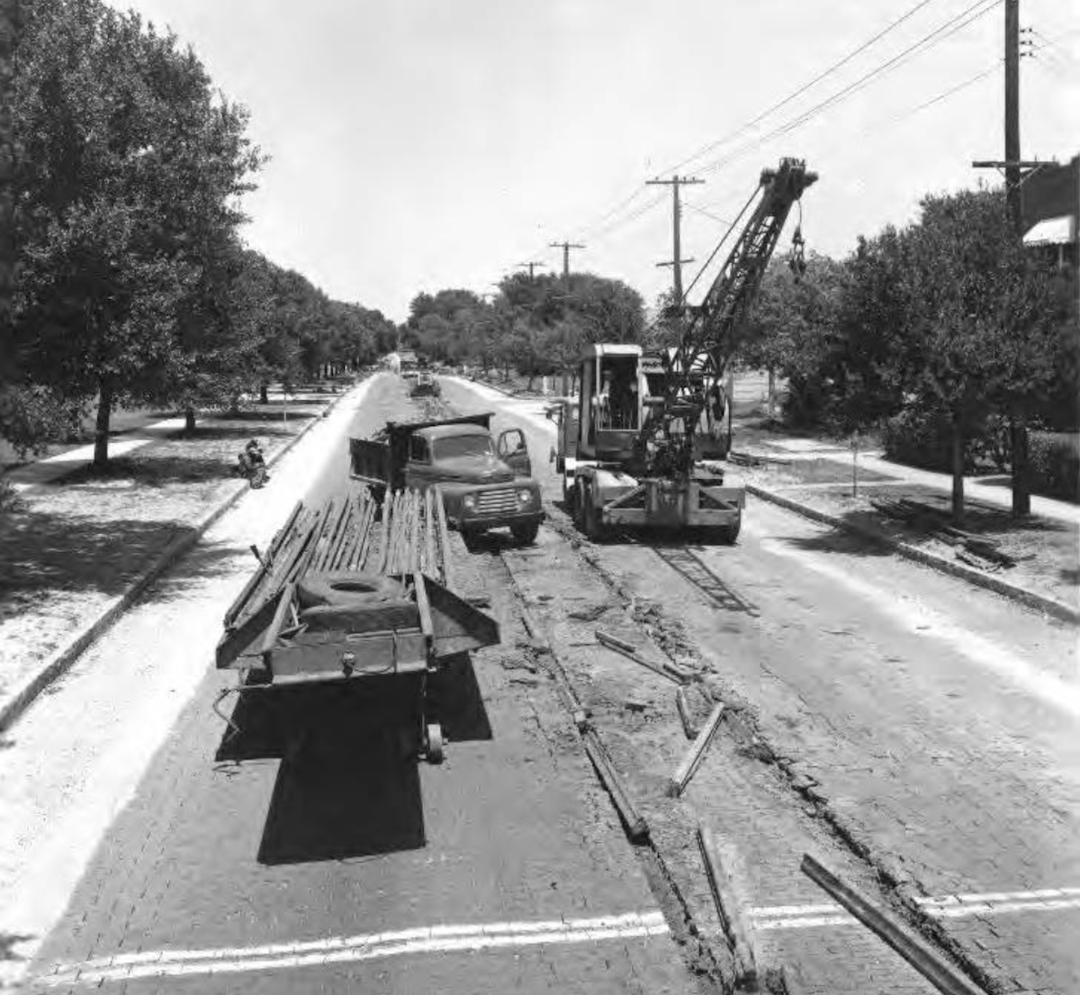 Removing streetcar tracks on Central Avenue near Hillsborough Avenue in Tampa, Florida in 1950. - Photo by Burgert Brothers via ia Tampa-Hillsborough County Public Library System