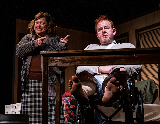 Annie Wilkes (Summer Bohnenkamp, L) torments her favorite author (David Jenkins), whom she happens to be holding hostage until he can ressurect her favorite literary character. - Photo by Stage Photography of Tampa via Jobsite Theater/Flickr