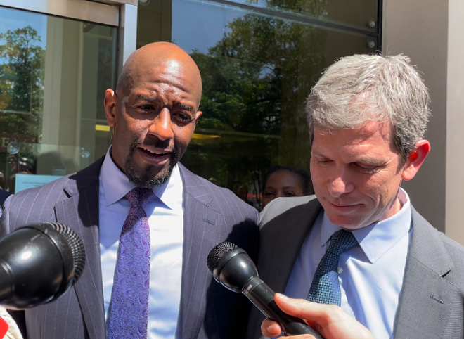 Former Democratic nominee Andrew Gillum (left) and attorney David Markus spoke after a jury acquitted Gillum on one charge and couldn't reach a verdict on other charges. - Photo by Dara Kam/NSF