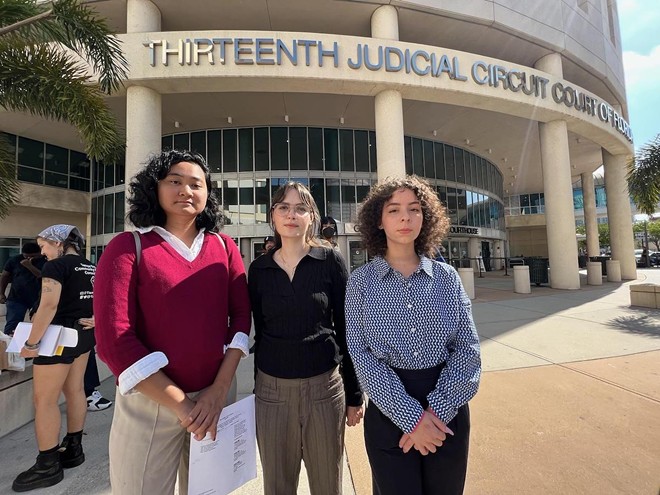 (L-R) Chrisley Carpio, Lauren Pinero, Laura Rodriguez outside the Thirteenth Judicial Circuit Court in Tampa, Florida on May 17, 2023. - Photo by Dave Decker