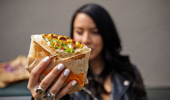 Announced Wednesday afternoon, this creation features a blend of vegan nacho sauce, vegan blanco sauce and boldly seasoned plant-based "beef" plus the classic toppings. - Photo c/o Taco Bell
