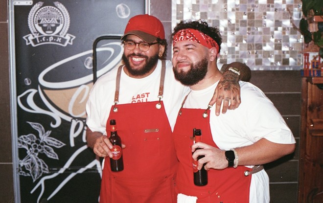 Guillermo Quezada (L) and Hassan Lewis at L.P.C.X. Cafe. in Tampa, Florida on Aug. 13, 2023.