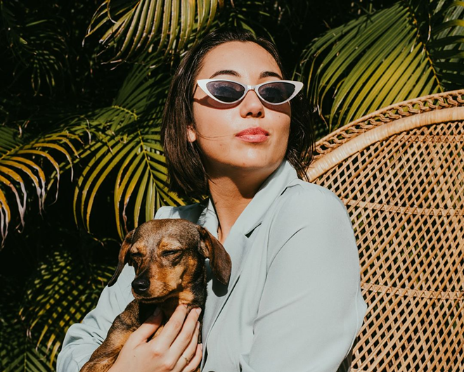 Selene San Felice and her chiweenie miniature pinscher mix Sophia. - Photo by Stephanie Agudelo