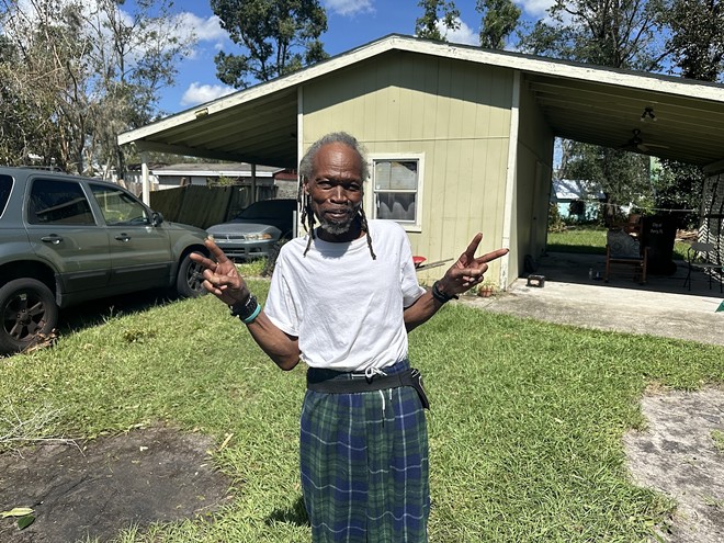 Wallace Hawkins, 66, outside his Perry home on Sept. 27, 2024, one day after Hurricane Helene passed through. - Photo by Liam Fineout