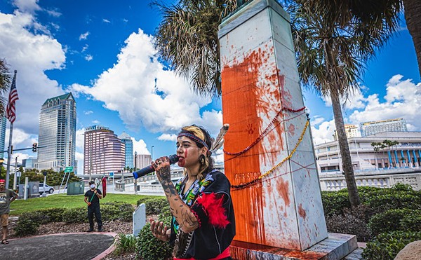 Alyssa Gallegos speaks during a protest of Tampa's Christopher Columbus statue in 2021.