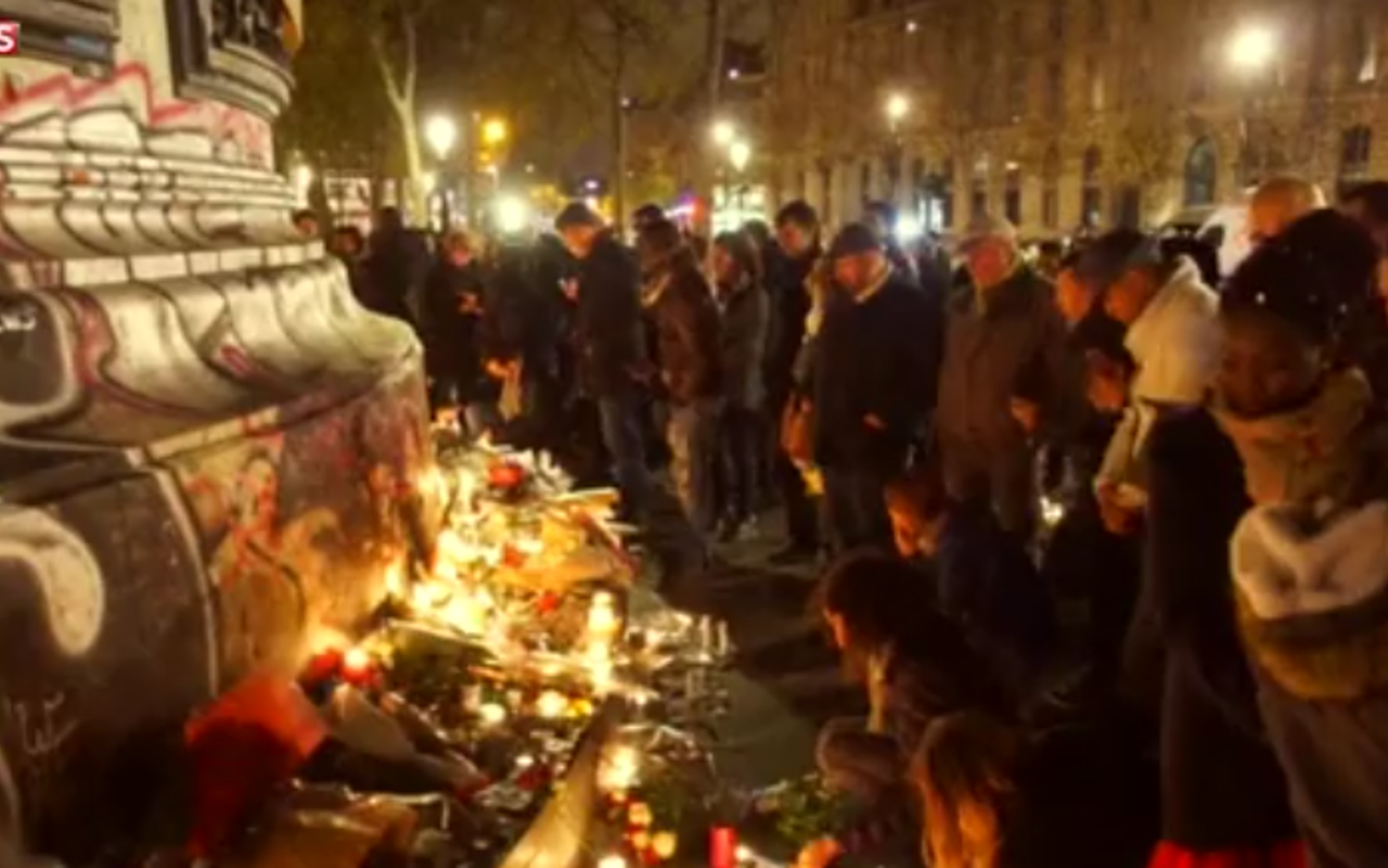 Mourners pay tribute in Paris after the attacks.