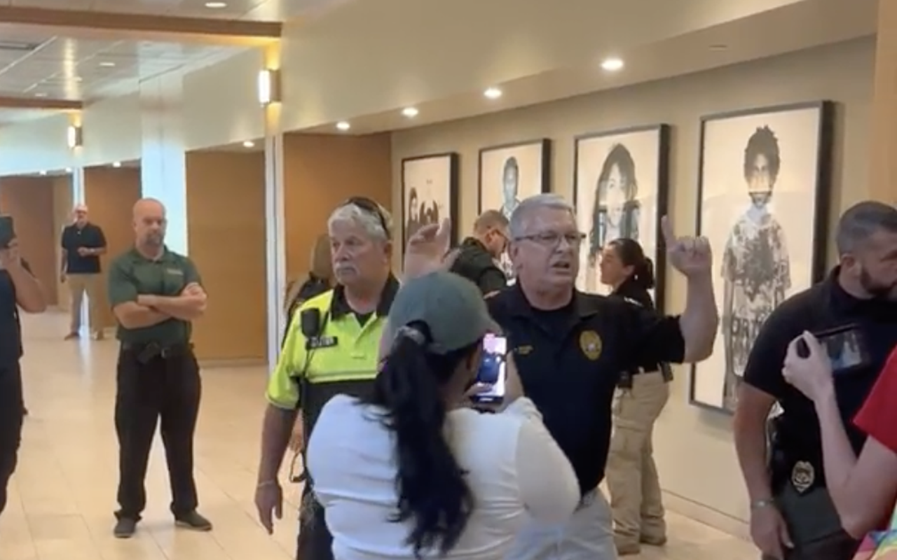 USF Police Chief Christopher Daniel yells at students during a diversity rally after arresting a young woman.