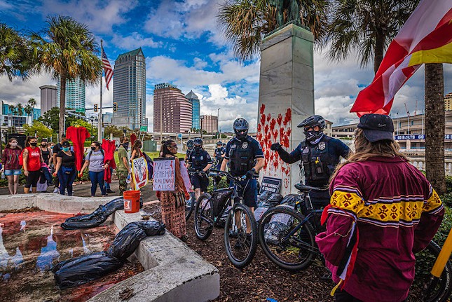 Protesters march on Bayshore to demand removal of Tampa's Columbus statue