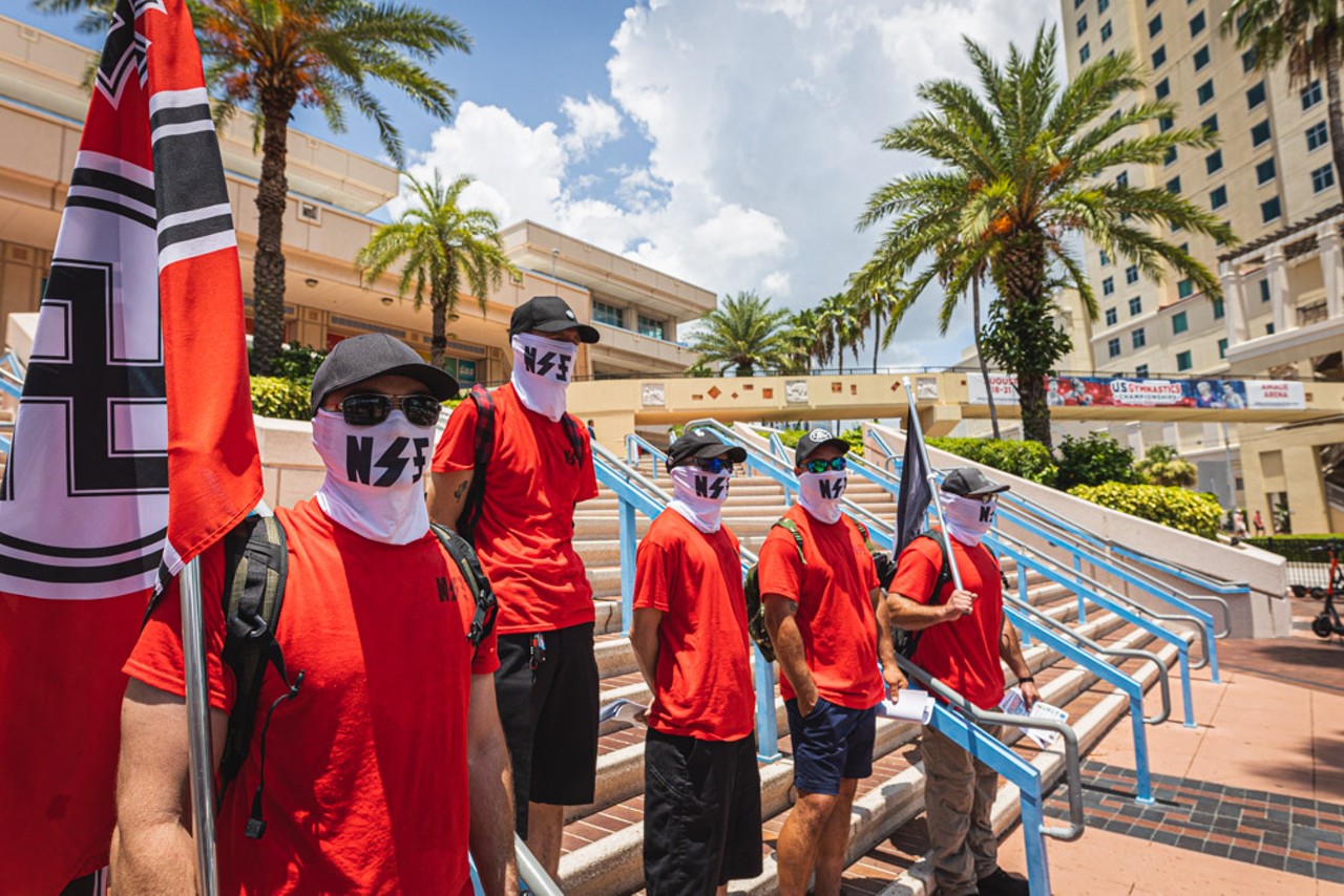 Photos: Neo-Nazis gather outside Turning Point USA summit at Tampa Convention Center