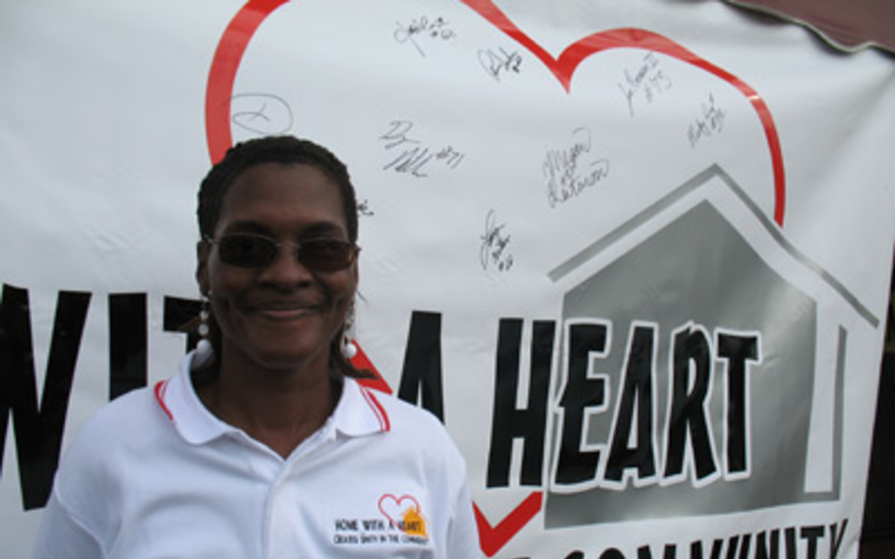 RETURNING THE FAVOR: Charlene Banks once received help from Home With A Heart; now she's a volunteer.