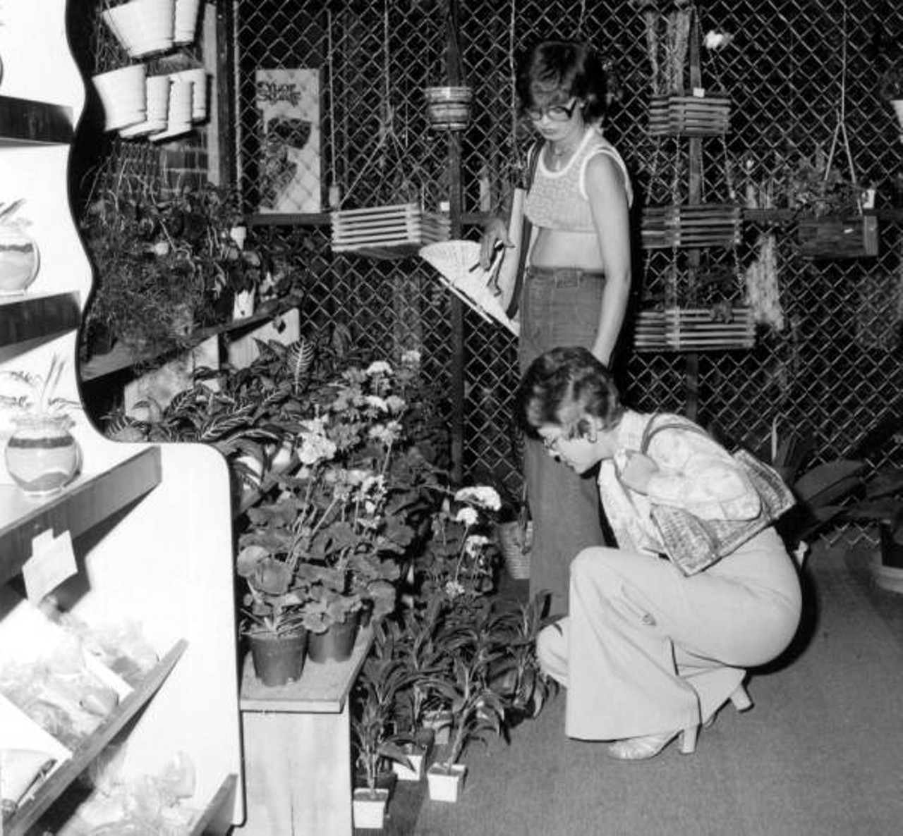 Shopping in the "nostalgia market area" in Ybor City - Tampa, Florida (1975).