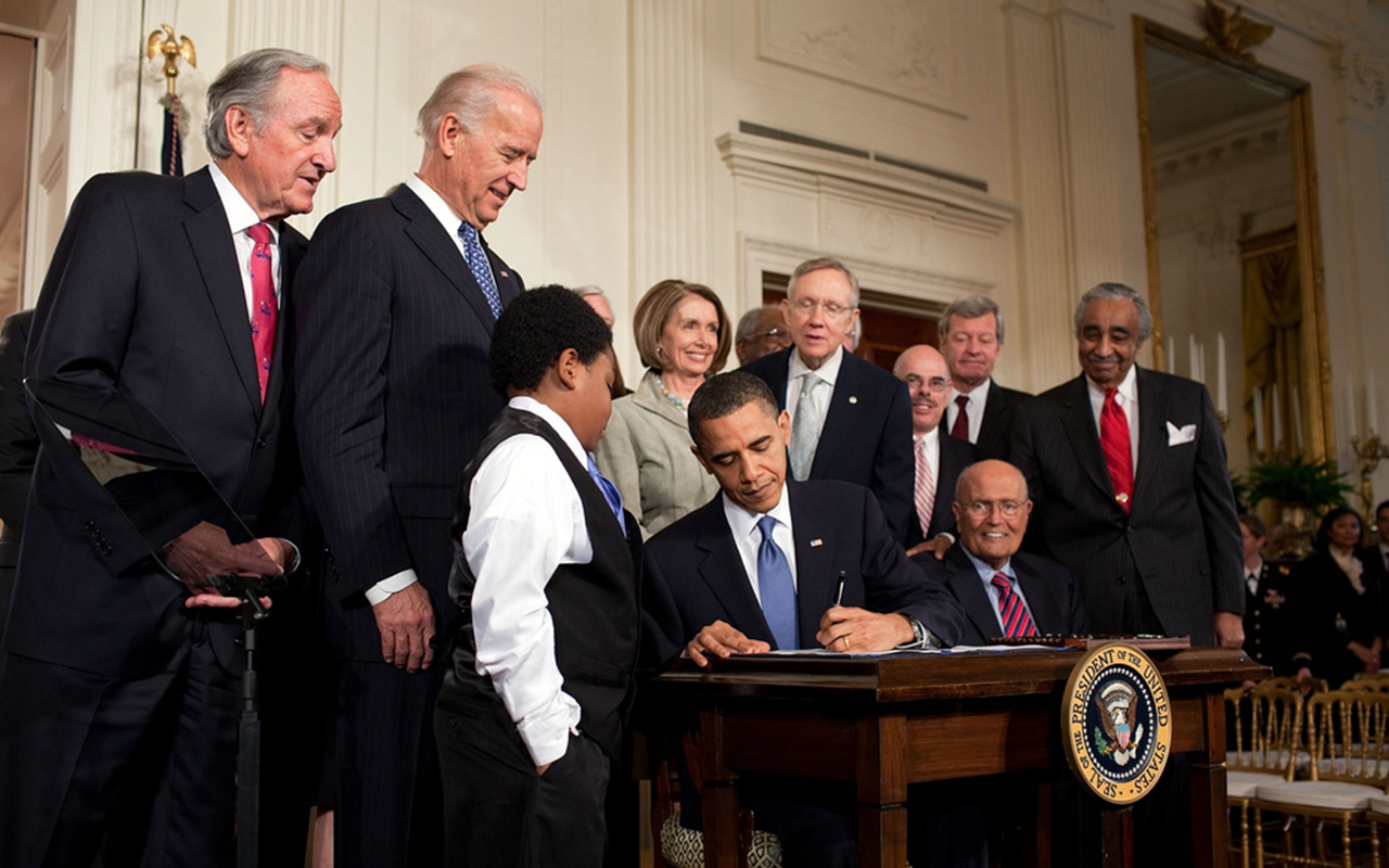 President Obama signing the Patient Protection and Affordable Care Act on March 23, 2010.