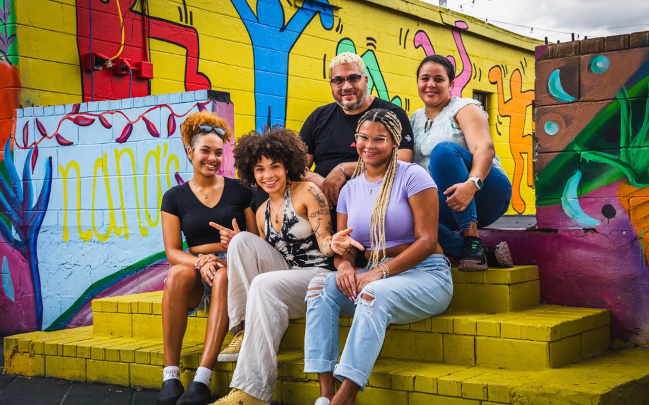 Anisa Mejia (center-front), chef-owner of Nana’s Juice Bar & Restaurant with her team in Ybor City, Florida on July 28, 2023.