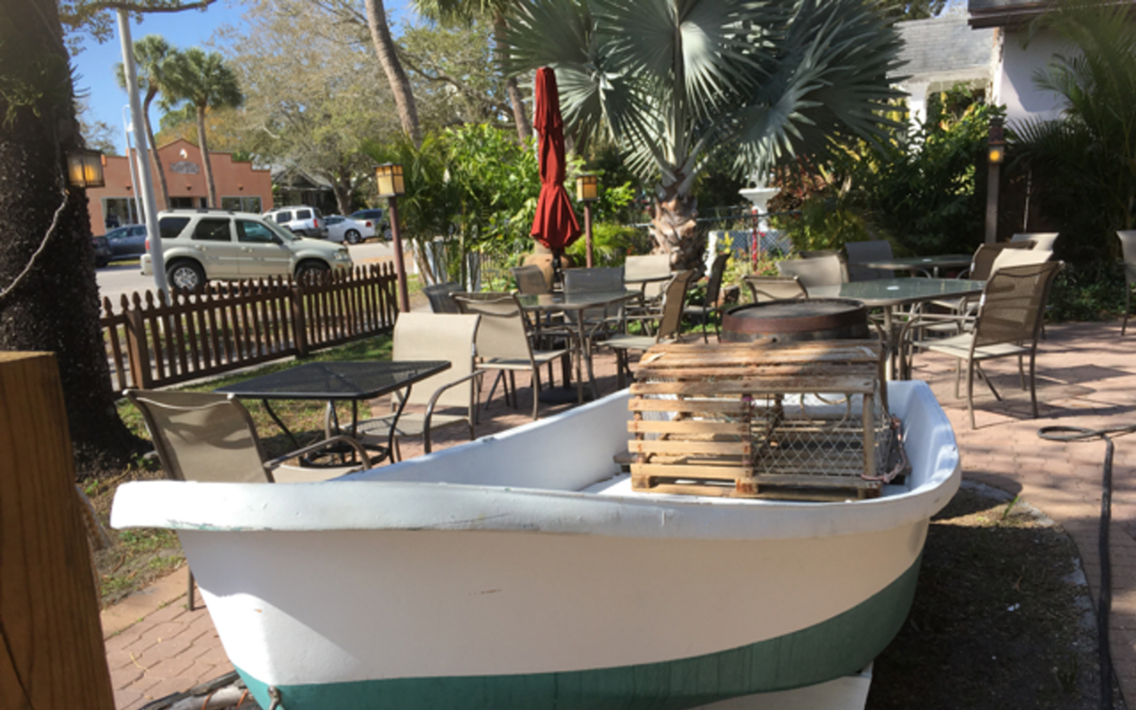 An old boat and crab traps are part of Fish's outdoor dining decor.