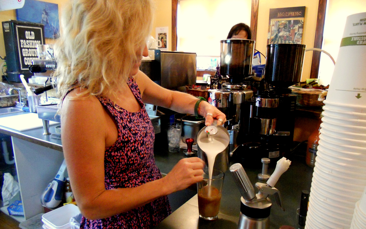 The Jet City proprietor crafts her signature Cafe Borgia latte.
