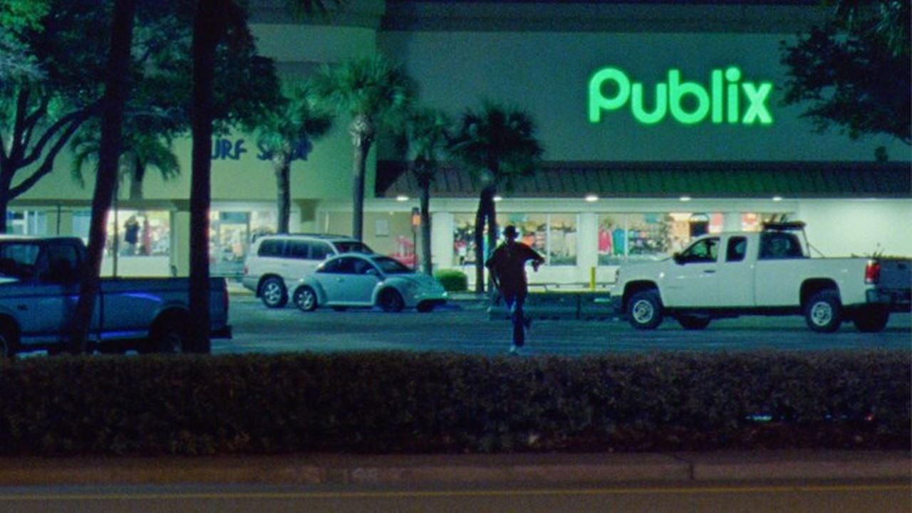 Publix at Dolphin Village Shopping Center
No, Zola and the rest don&#146;t go inside Publix to grab Pub Subs, but the bright green sign of Florida&#146;s favorite grocery store chain makes a cameo in the film. Specifically, the Publix and shopping plaza across from the St. Pete Beach access and the Dolphin Beach Resort. One hilarious shot shows Derek running through the Publix parking lot.
Photo via A24/Twitter